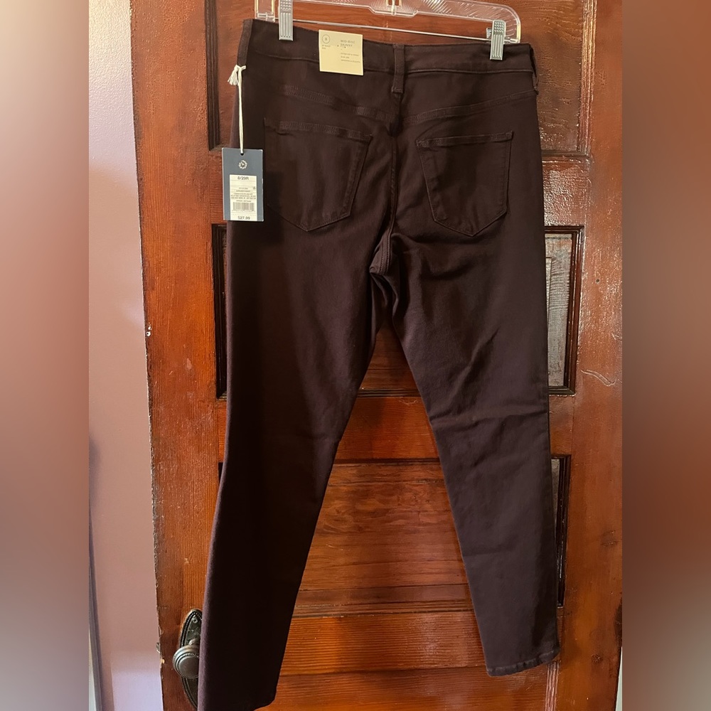 Ladies jeans plum color size 8 NWT